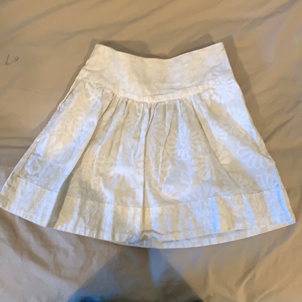 Child beige skirt with flowers